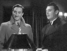 Basil Rathbone and George Brent