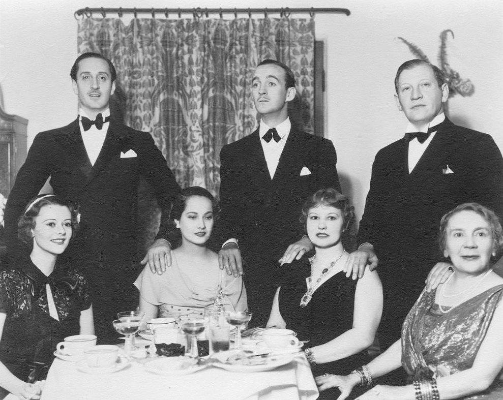 The Rathbones and guests including David Niven and Merle Oberon 