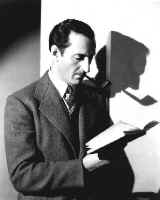 Basil Rathbone reading a book