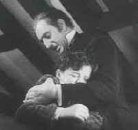 Rathbone beating Freddie Bartholomew in "David Copperfield"