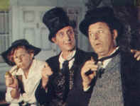 Jimmy Boyd, Rathbone and Jack Carson in "Huck Finn"